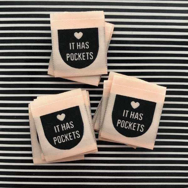 “IT HAS POCKETS” Woven Clothing Labels (Pack of 8)
